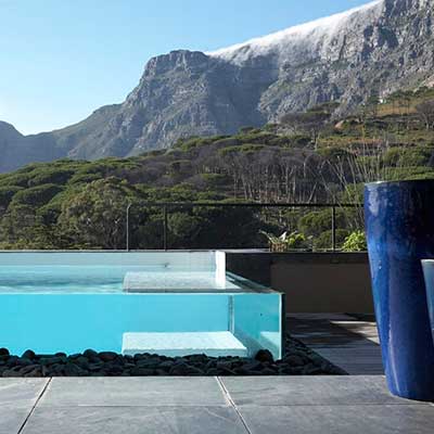 Glass upstand flush deck pool on first floor.